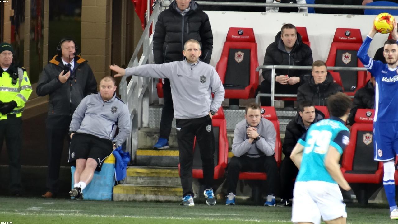 SoFi Stadium exterior in bright daylight.